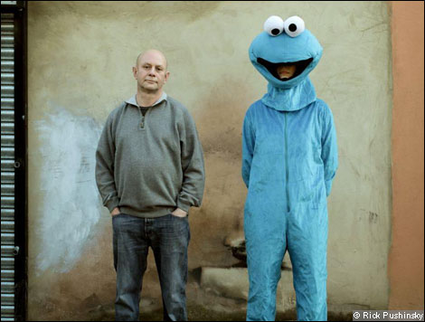 Nick Hornby with a mascot at the Monster Supply Store