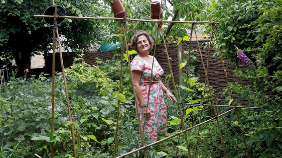 Harriet Lamb in her garden in Herne Hill, London